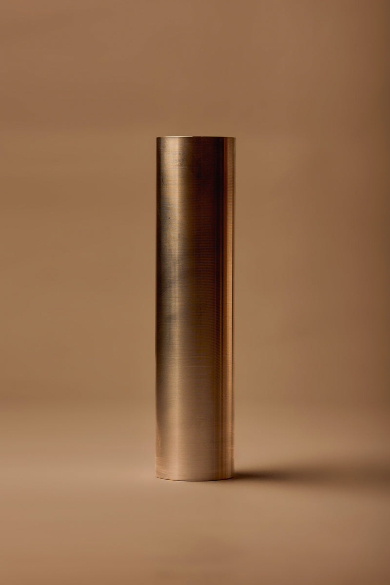 UY Studio CORE Tube made of stainless steel, minimalist Ikebana flower vase and candle holder for modern interior design Berlin Germany