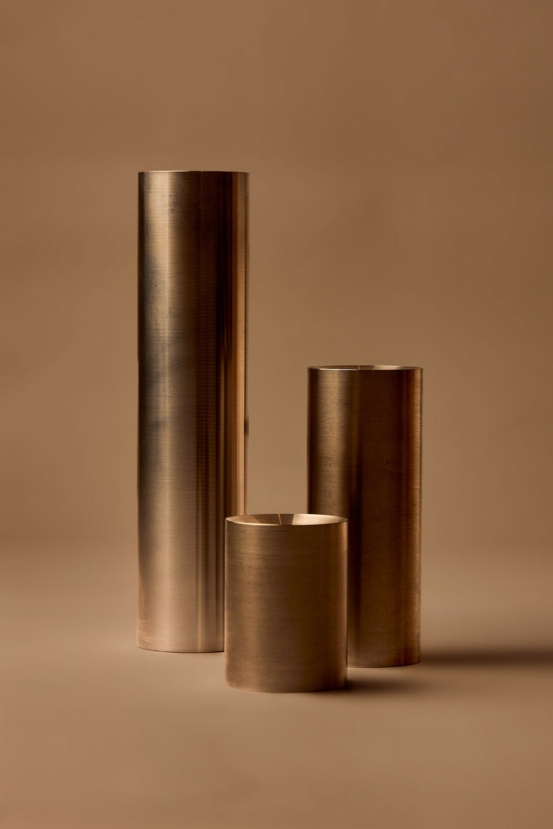 UY Studio CORE Tube made of stainless steel, minimalist Ikebana flower vase and candle holder for modern interior design Berlin Germany