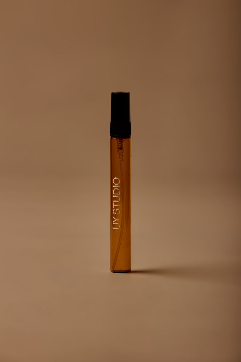 UY Studio T 10 ml travel-size unisex eau de parfum from Berlin, a niche fragrance with a black tea, rose, cedarwood and musk scent, unisex gift idea.