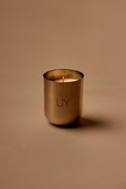 UY Studio S Steel Candle luxury handmade scented candle in a minimalist stainless steel jar, crafted in Berlin, Germany. High-quality fragrance with Bergamot, Rose, Cardamom, Jasmine and Amber notes.